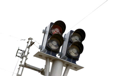Traffic lights at railway station isolated on whiteの写真素材