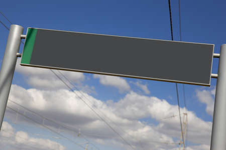Railway signpost without text under a blue skyの写真素材