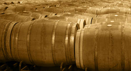 Wine barrels in an aging process at spanish cellar