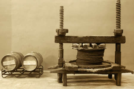 Wine barrels and old cellar press system の写真素材