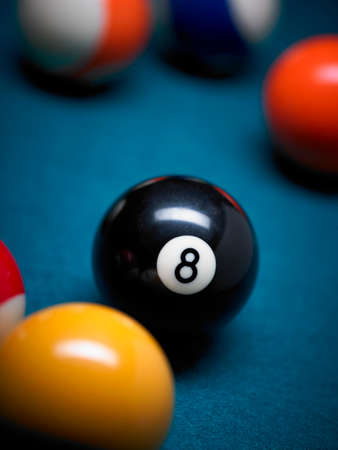 Pool balls close up with focus on the black 8 number verticalの写真素材