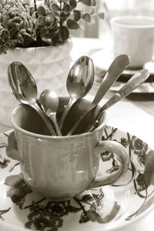 metal cutlery in a cup black and whiteの写真素材