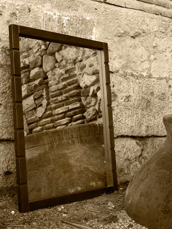 Stone Wall reflected on a mirror black and white verticalの写真素材
