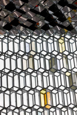 Facade detail and roof of Harpa Concert Hall in Reykjavik vertical black and white