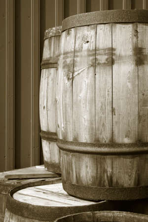 Rusted old oak barrels to preserve herring captures vertical
