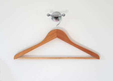 Wood Hanger and holder on a white wall