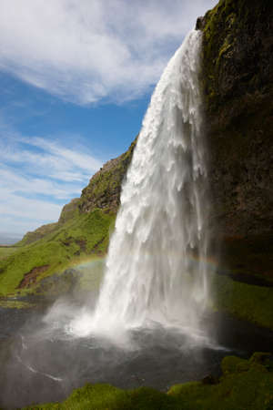Seljalandsfoss spraying waterfall in south area of Icelandの写真素材
