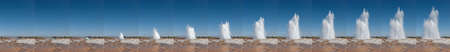 Geyser Strokkur eruption sequence against blue summer sky  Icelandのeditorial素材