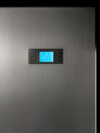 Modern refrigerator display control panel in aluminum surface 