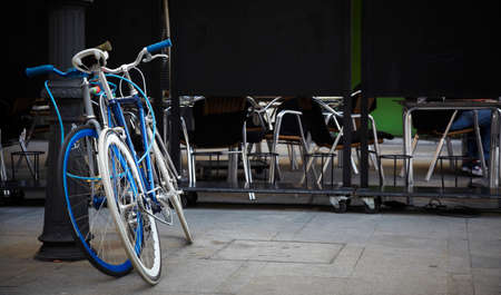 Locked urban bikes on a street  Horizontal の写真素材