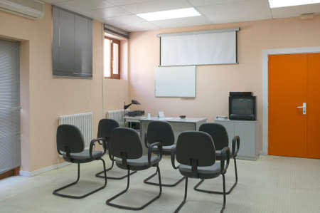 Classroom with projector, screen and board 