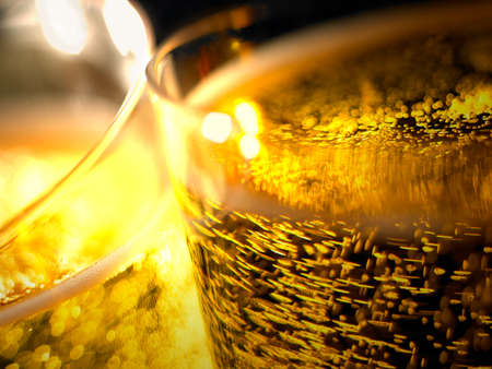 Champagne bubles detail in a glasses  Warm tone
