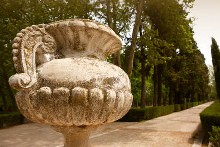 Antique marble pots in a garden  Sepia tone  Horizontal formatの写真素材