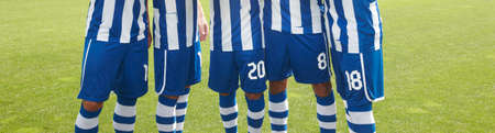 Five football players in the ground  Horizontal format