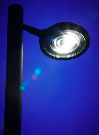 Modern street lamp by night  Vertical formatの写真素材