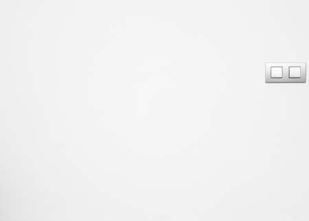 Two switches on a white wall  Horizontal formatの写真素材