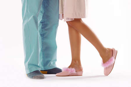 Man and woman dressed in pyjama isolated on whiteの写真素材