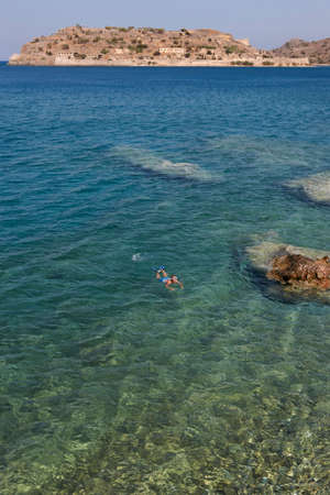Mediterranean sea and Spinalonga island. Crete. Greece. Verticalのeditorial素材