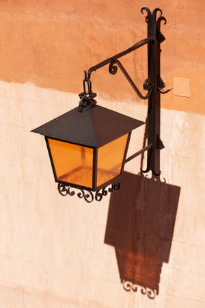 Antique metallic street lamp in Albarracin. Spain. Verticalの写真素材