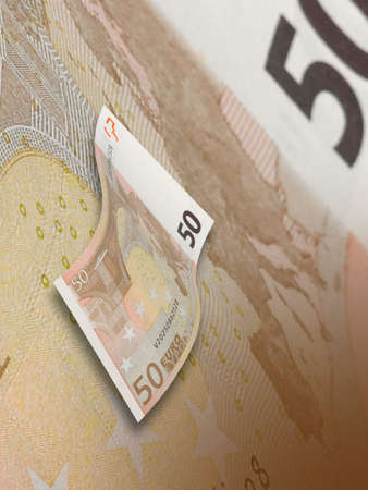 Fifty euro bills collage with warm tone. Vertical format