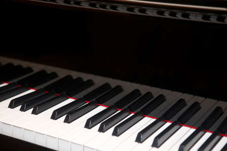 Piano keys detail in horizontal format. Out of focus