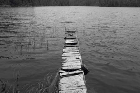 Wooden abandoned dock in a lake. Vancouver. Canada. Horizontal formatの写真素材