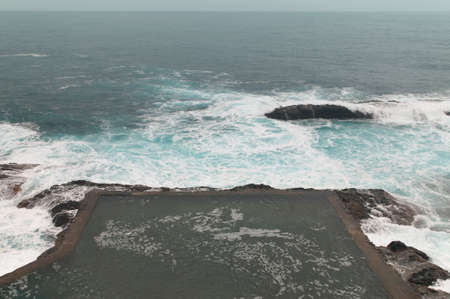 Rocky pool with salty water near the ocean. Gomera. Horizontalの写真素材