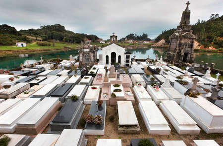 Landscape with cemetery and river in Barro, Asturias. Spainの写真素材