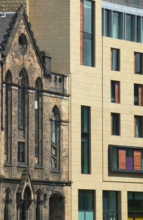 Antique and modern facades buildings in Edinburgh. Scotland. UK. Verticalの写真素材