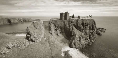 Dunnottar castle ruins in scottish coastline. Stonehaven. Scotland. UK. Horizontalの写真素材
