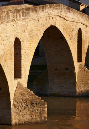 Romanesque stone bridge detail in Fuente la Reina. Navarra, Spain. Verticalの写真素材