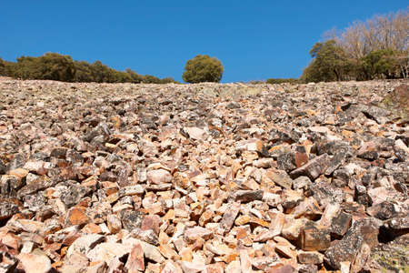 Landscape with rocky ground and trees in Cabaneros, Spain. Horizontalの写真素材