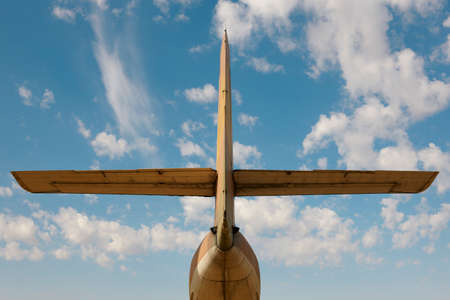 Aircraft tail rear view with blue sky background. Horizontalの写真素材