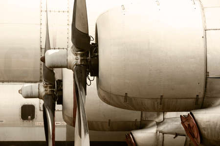 Old aircraft propeller engines airframe and blades in warm tone. Horizontalの写真素材