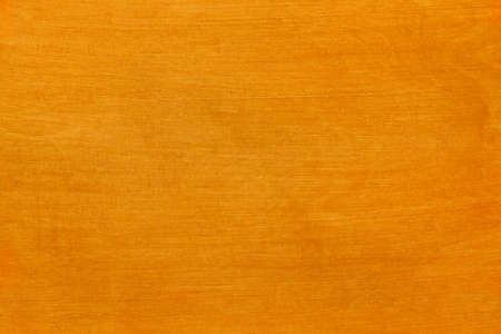 Varnish piece of wood in warm tone in horizontal formatの写真素材