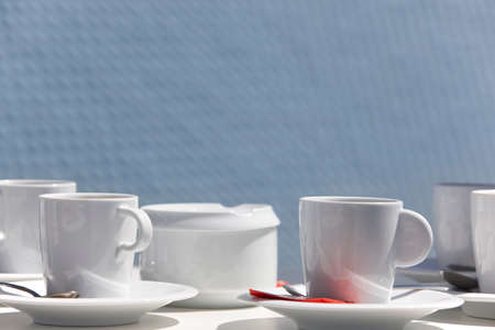 Breakfast service ready to be served with blue background outdoor. Horizontal