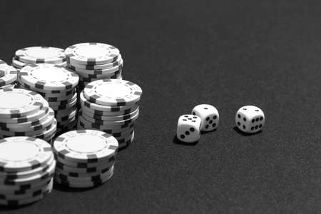 Crabs and betting chips in a table game. Black and whiteの写真素材