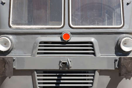 Antique locomotive front cabin detail in grey tone. Horizontal