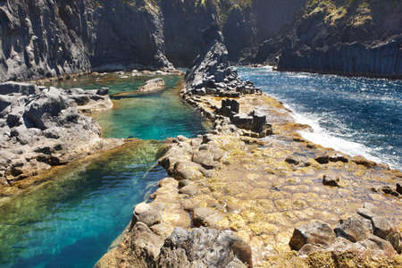 Azores basalt coastline in Sao Jorge. Faja do Ouvidor. Portugal. Horizontal