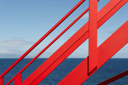 Coastline viewpoint with red stairs in Pico island. Azores. Portugal. Horizontalの写真素材