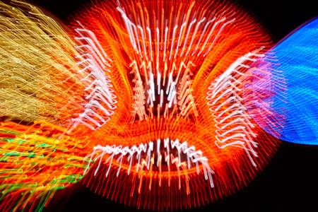 Moving colored lights background. Abstract backdrop in horizontal format