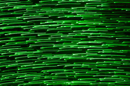 Moving green lights background. Abstract backdrop in horizontal formatの写真素材