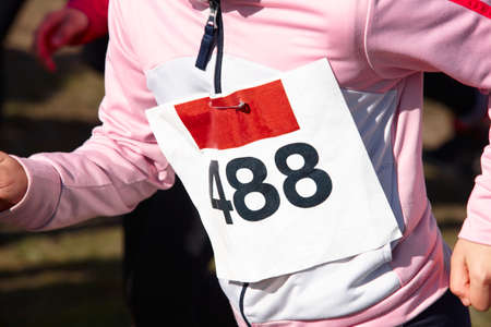 Young athletic runner on a country race. Outdoor circuit. Horizontalの写真素材