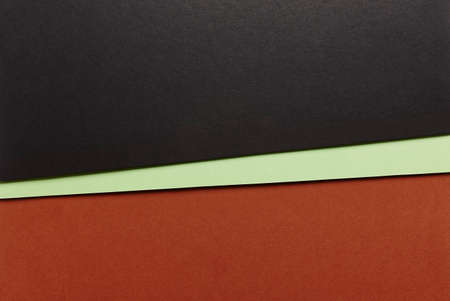 Colored cardboards background in black, green, red tone. Copy space. Horizontalの写真素材