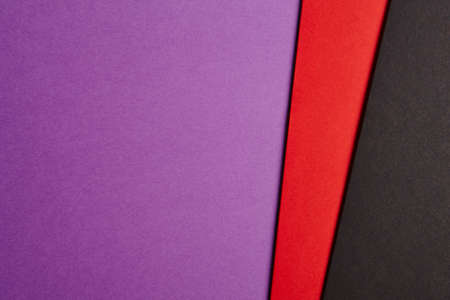Colored cardboards background in purple red black tone. Copy space. Horizontalの写真素材
