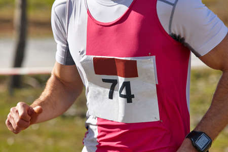 Senior athletic runners on a cross country race. Outdoor circuit. Horizontalの写真素材