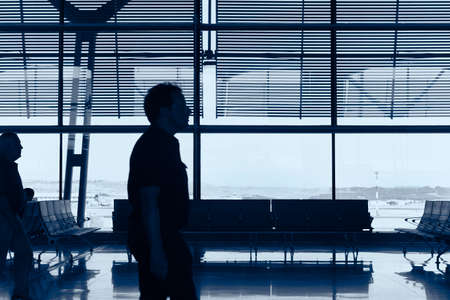 Airport indoor with people. Travel background. Business men. Horizontalのeditorial素材
