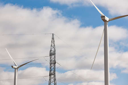 Wind turbine and power line. Clean alternative renewable energy. Horizontal