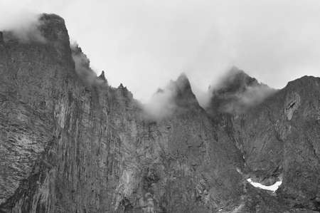 Norway landscape. Troll wall massif mountain Trollveggen. Romsdalen valley. Cloudyの写真素材