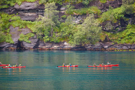 Norwegian fjord landscape with kayaks and rocks. Travel Norway. Horizontalのeditorial素材